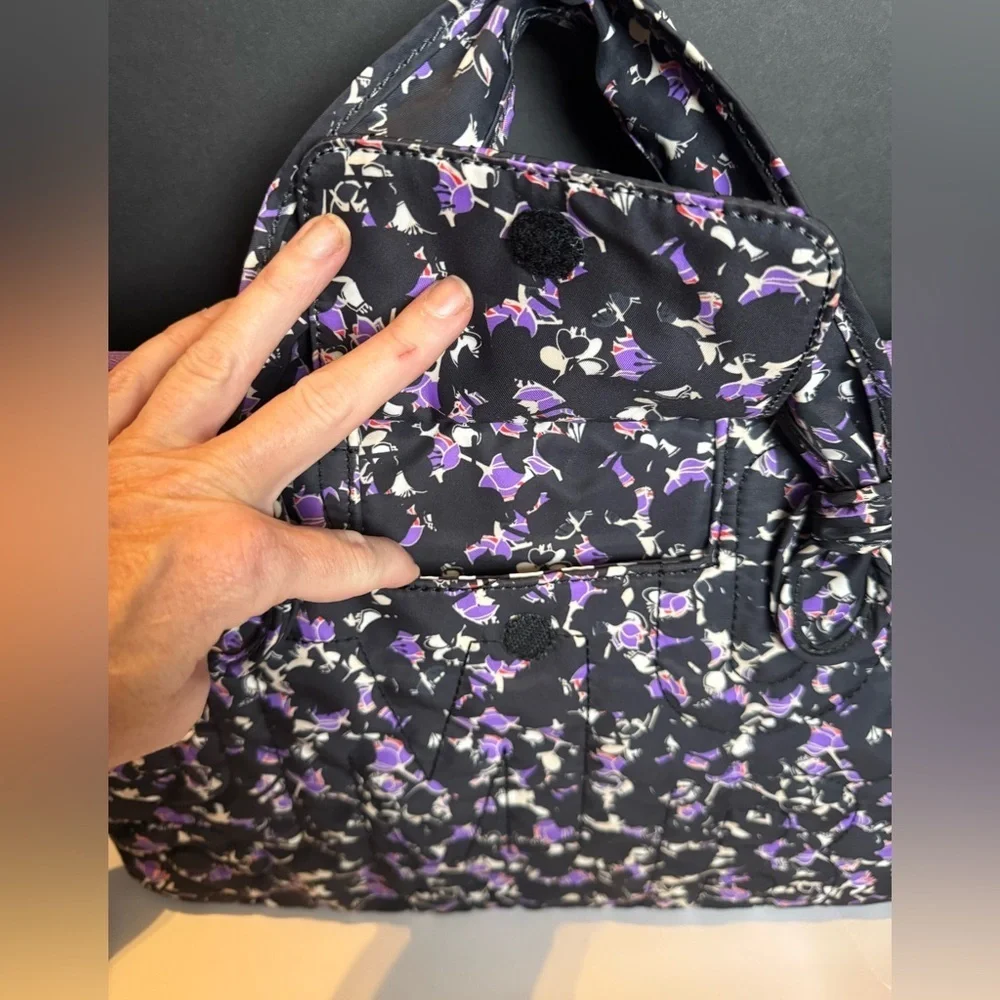 Marc by Marc Jacobs nylon laptop bag in a black and purple floral